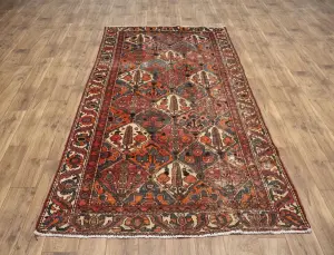 4'8x9'2 Hand Knotted Tribal Floral Oriental Wool Rug