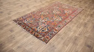 4'8x9'2 Hand Knotted Tribal Floral Oriental Wool Rug